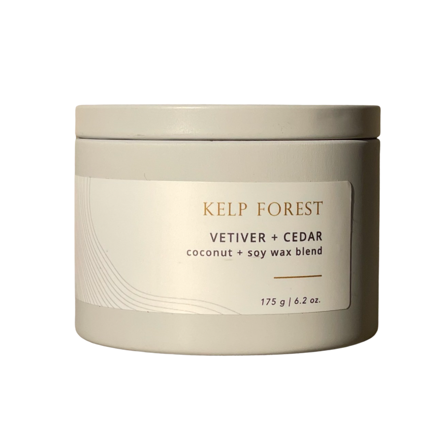 A grey tin with a label that reads Kelp Forest, vetiver and cedar made with coconut and saoy wax blend