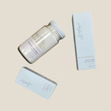 A set of three skincare products from Sealuxe, including a facial polish, antioxidant facial oil, and toner, packaged in a jar and two boxes.