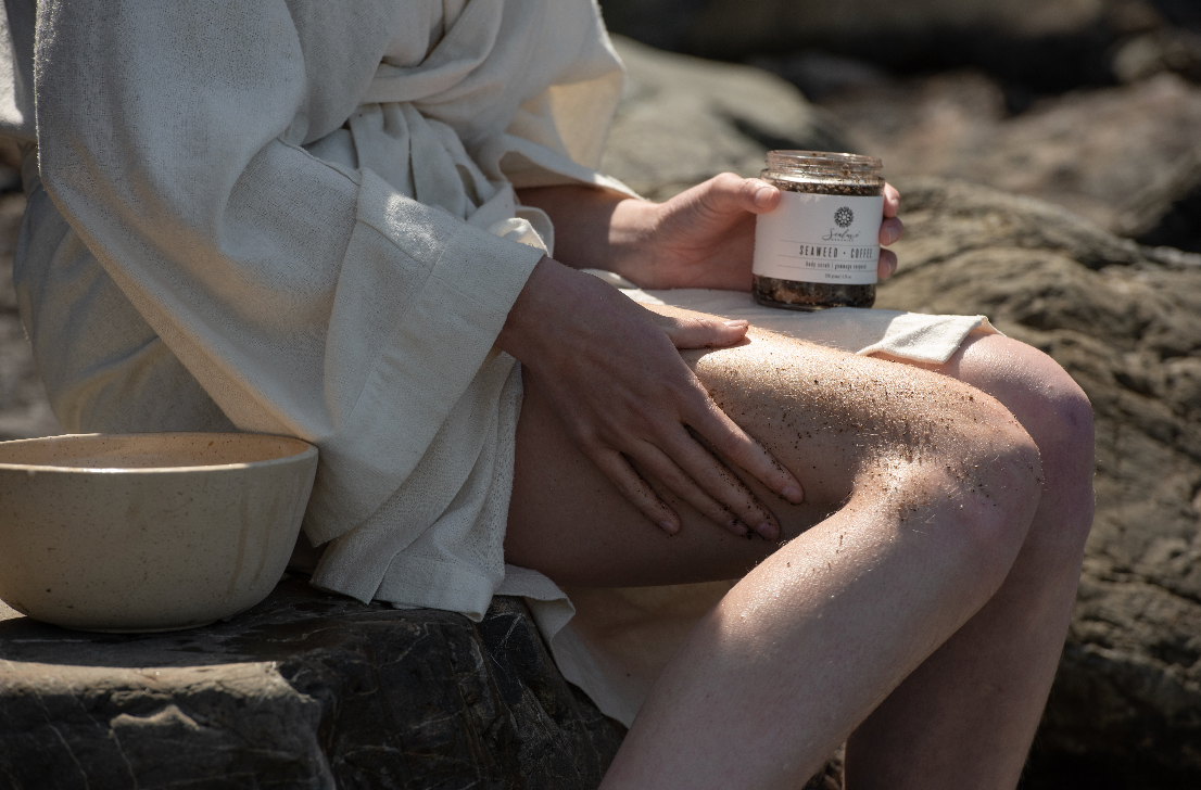 Sealuxe seaweed and coffee cellulite scrub used on the beach