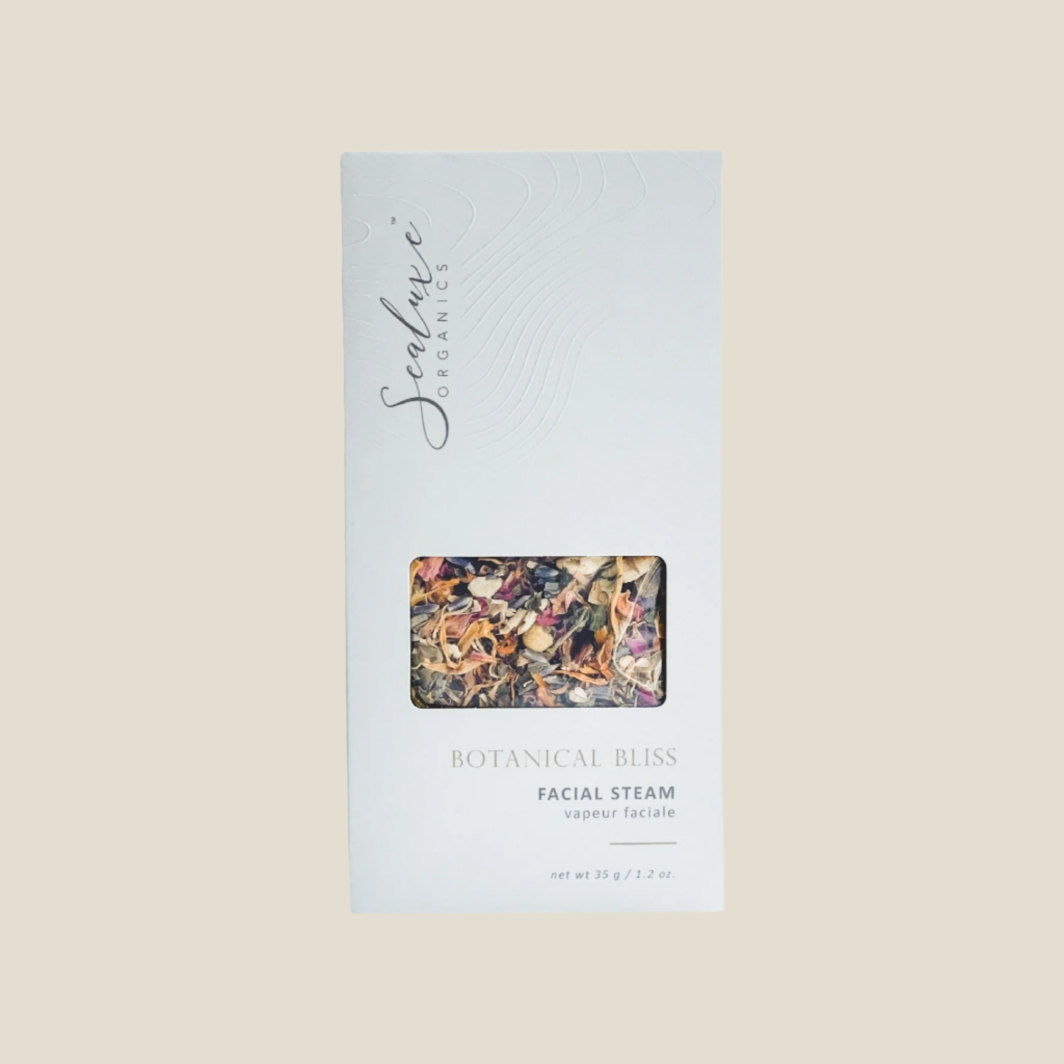 A packaged facial steam product from Sealuxe, with visible organic herbs and flowers blend inside the package.
