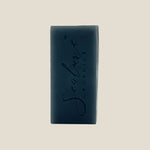 Black soap bar with 'Sculpt' branding on a white background