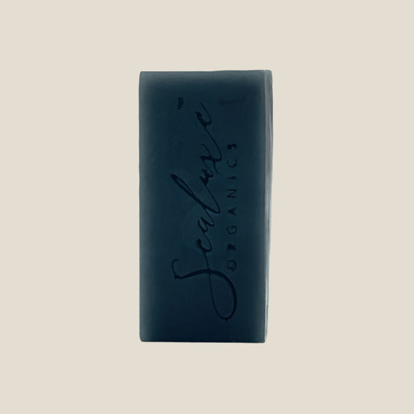 Black soap bar with 'Sculpt' branding on a white background