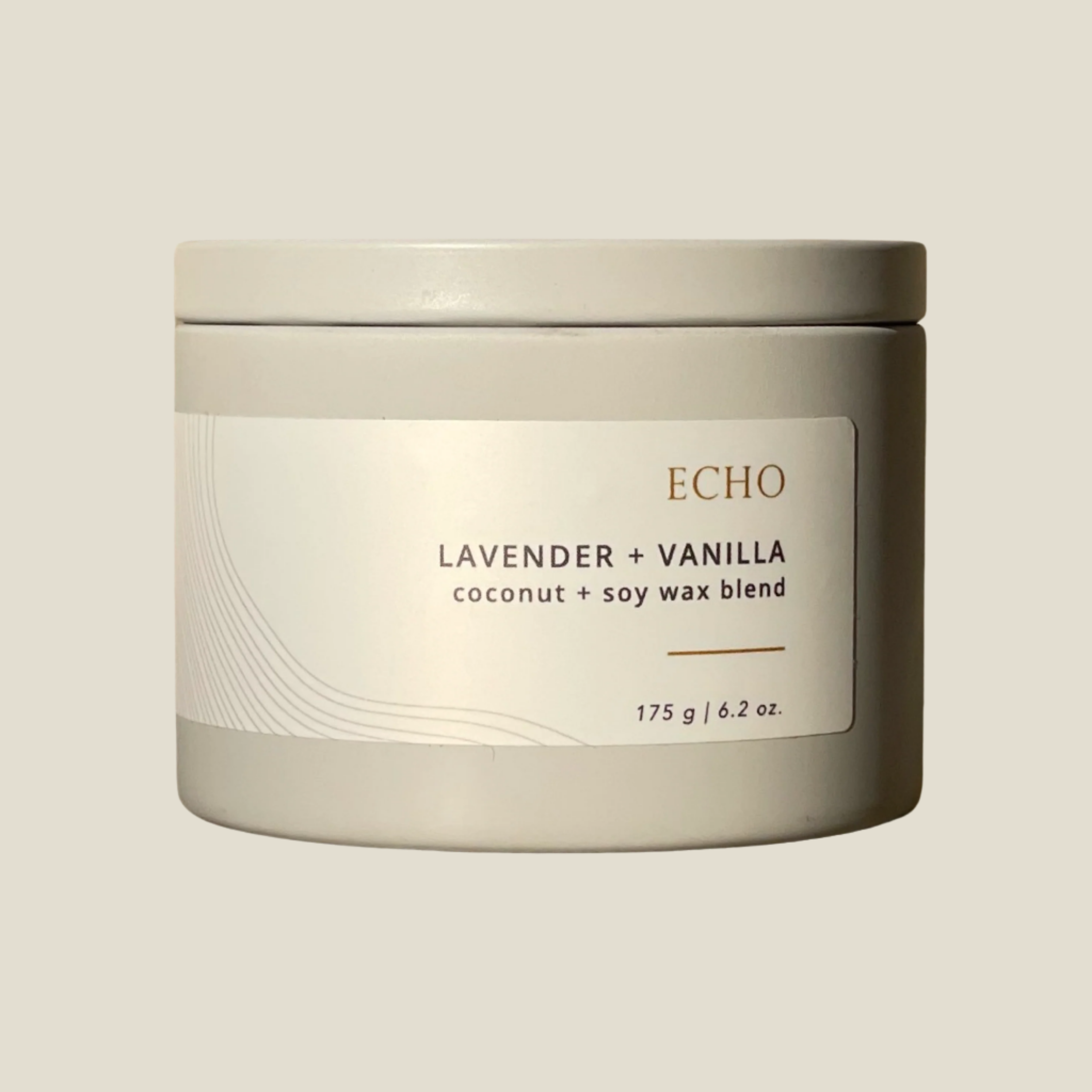 Echo candle in grey tin with white label, with the words lavender and vanilla and coconut + soy wax blend