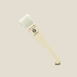 Paintbrush with wooden handle and white bristles on a light gray background