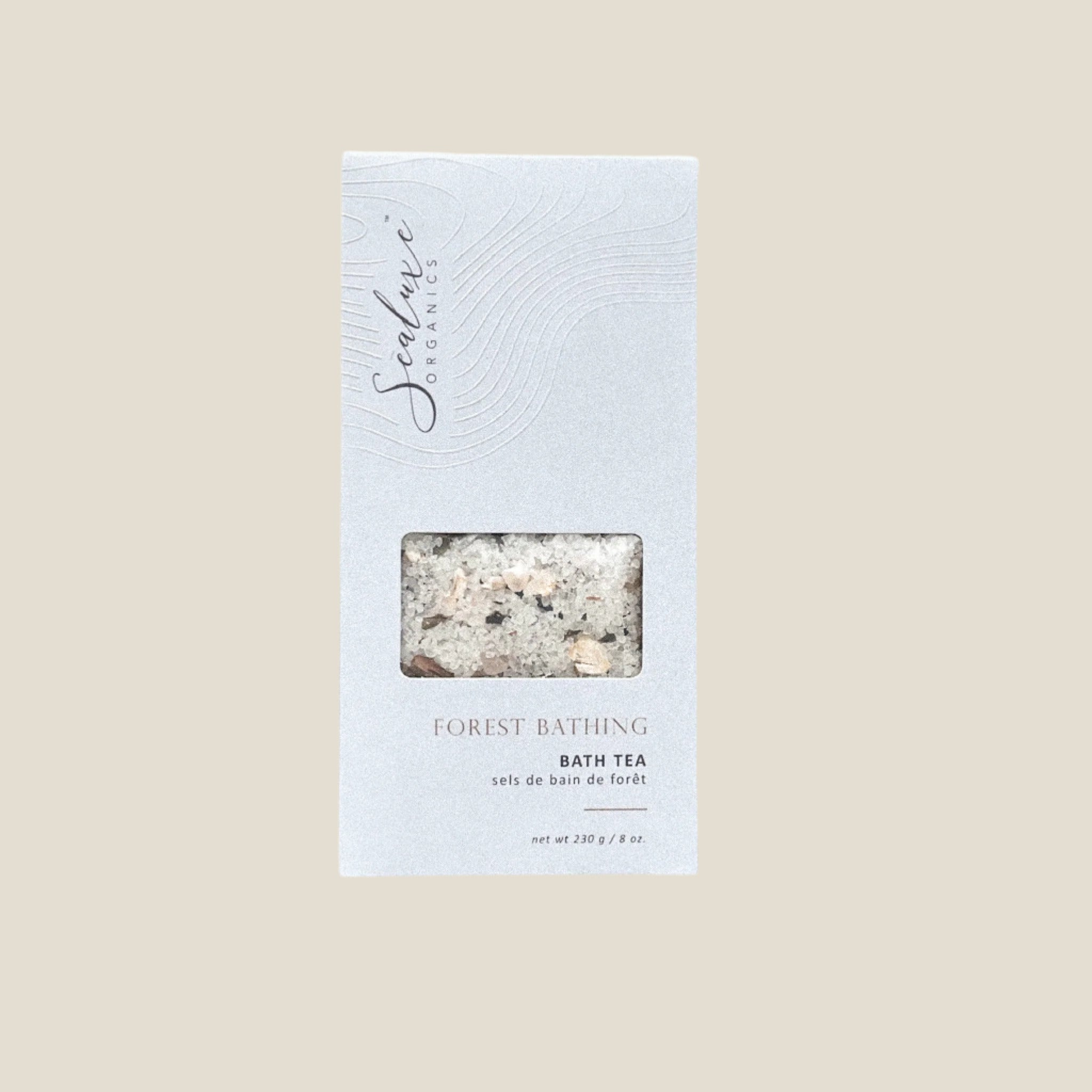 A packaged bath tea product labeled 'FOREST BATHING BATH TEA' from Sealuxe, visible through a clear window on the packaging.