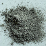 Gray powder on a light blue background