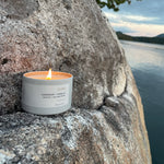 Sealuxe Echo candle on a natural rock surface