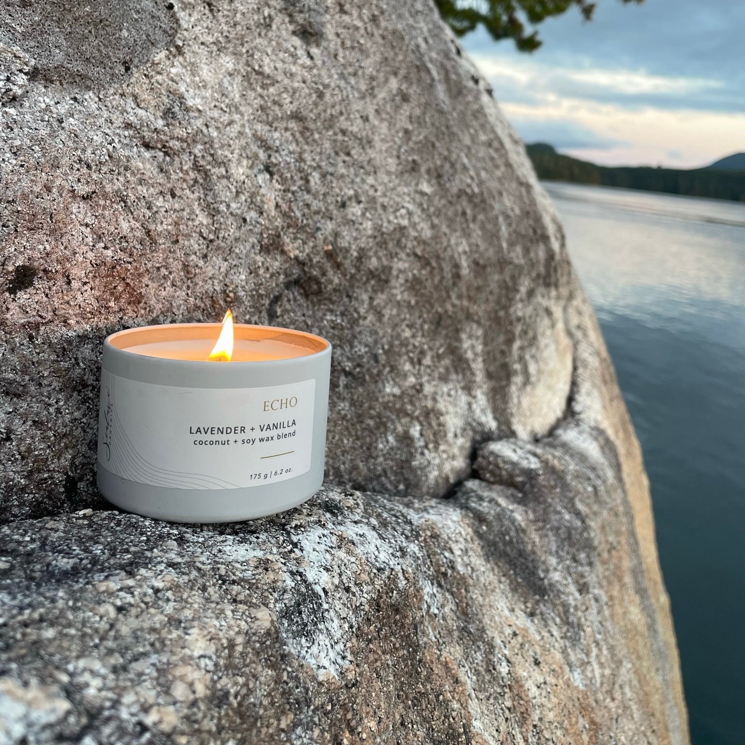 Sealuxe Echo candle on a natural rock surface