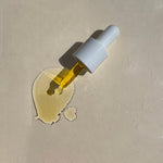 Close-up texture of Sealuxe facial oil on skin