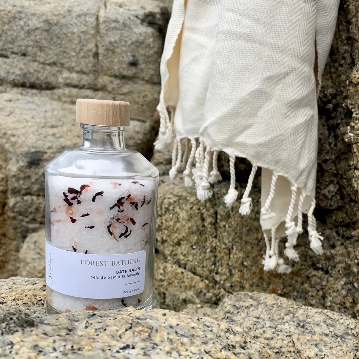 Sealuxe Forest Bathing bath salts displayed with a towel