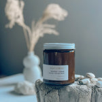 Sealuxe Kelp Forest amber glass candle with vetiver and cedarwood scent