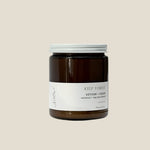 Sealuxe Kelp Forest candle in a natural outdoor setting