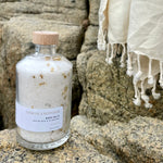 Sealuxe Lemon bath salts displayed beside a soft towel
