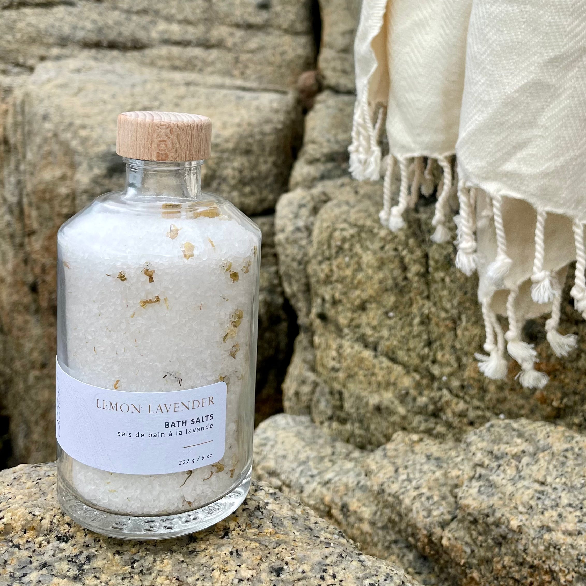 Sealuxe Lemon bath salts displayed beside a soft towel