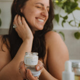 Sealuxe Mini Driftwood Body Butter jar styled on a natural surface