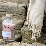 Sealuxe Rose bath product displayed with a towel