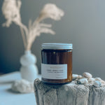 Sealuxe West Coast amber glass candle with cedar and birch scent