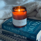 Sealuxe West Coast amber glass candle with cedarwood scent