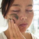 Woman with Sealuxe facial mask applied to her face
