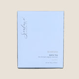 A square white box of Sealuxe Organics Seaweed Bath Tea. The box features elegant black cursive branding and gold text indicating the product name and type.