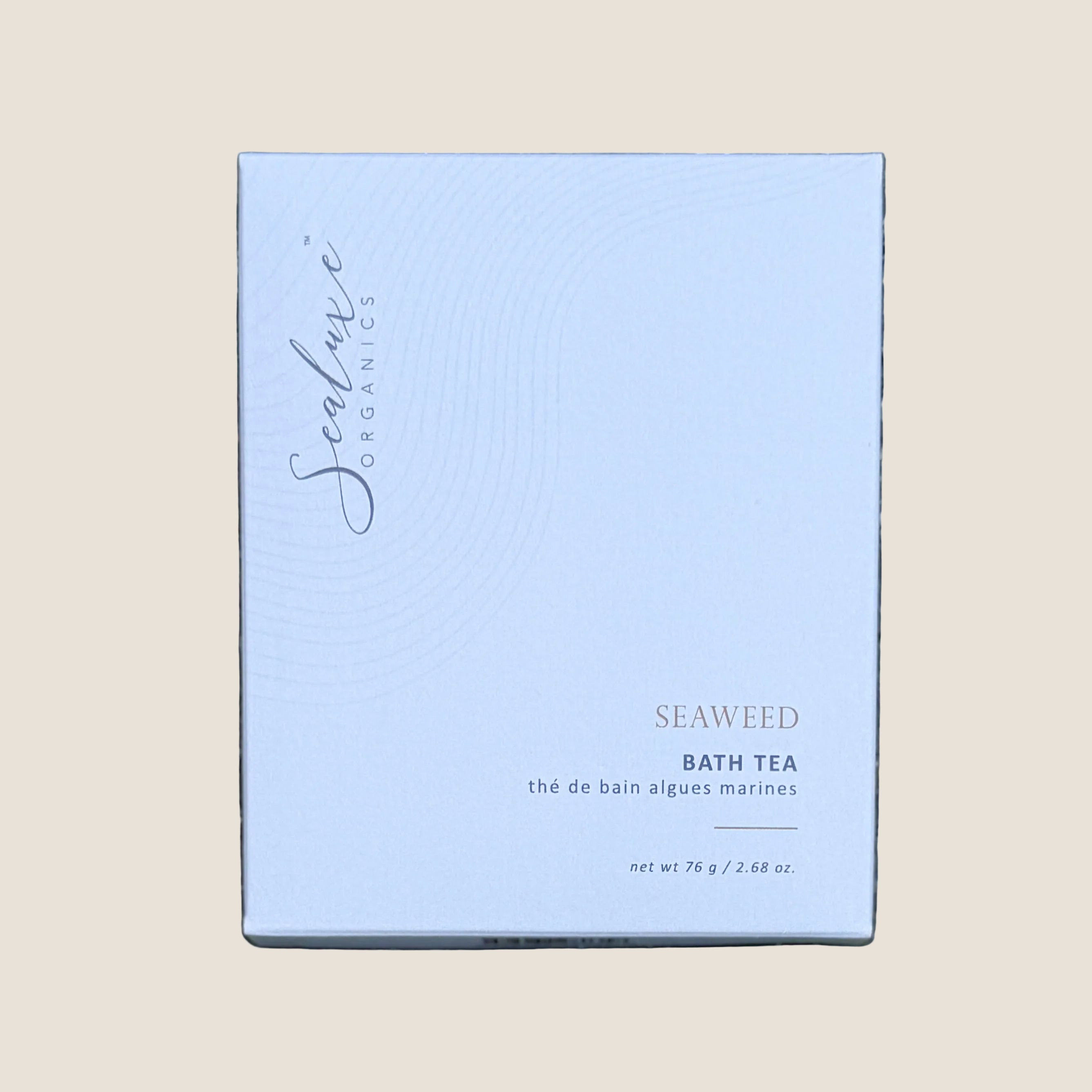 A square white box of Sealuxe Organics Seaweed Bath Tea. The box features elegant black cursive branding and gold text indicating the product name and type.
