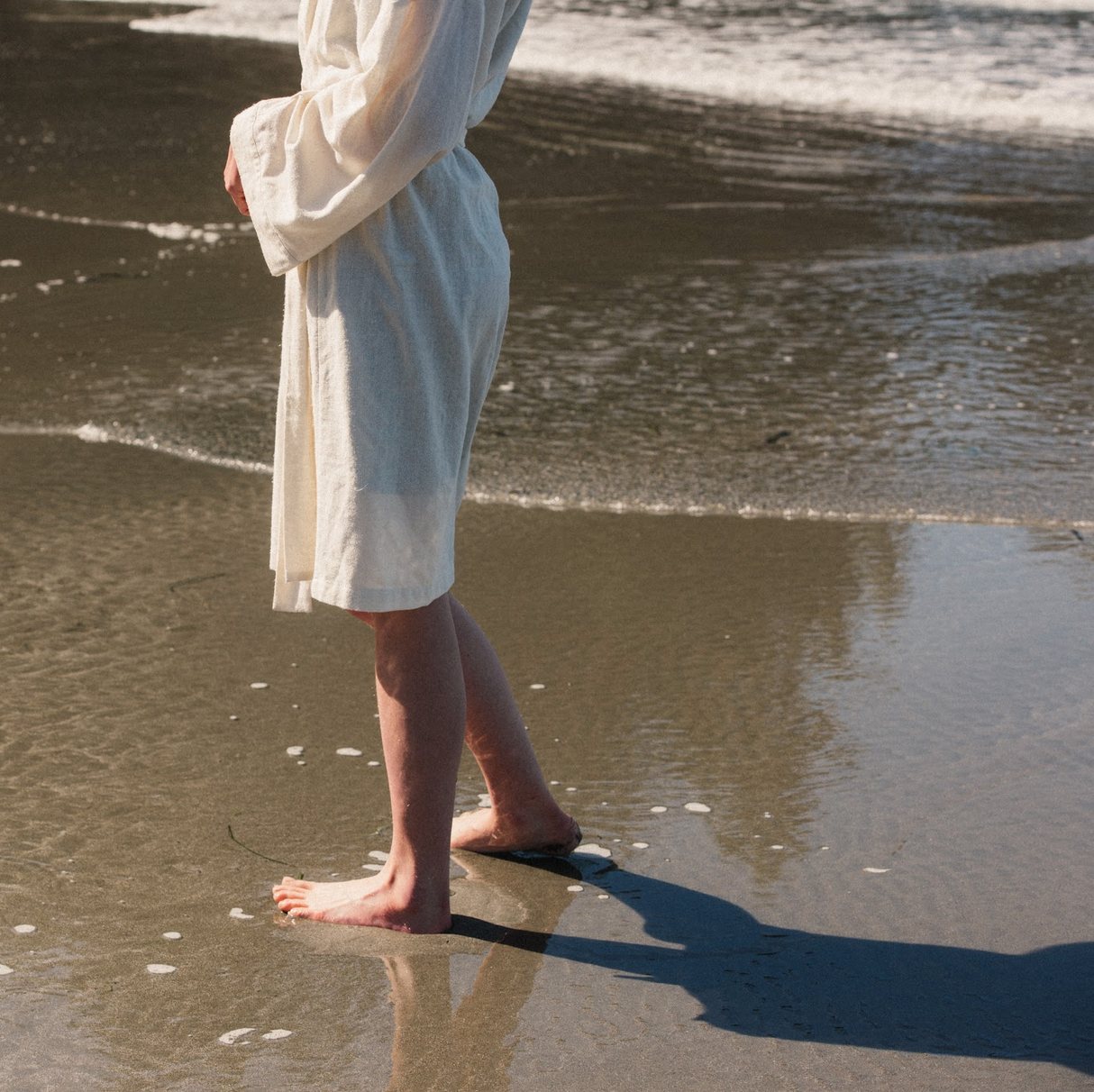 thalassotherapy walking in the ocean as the tide comes in