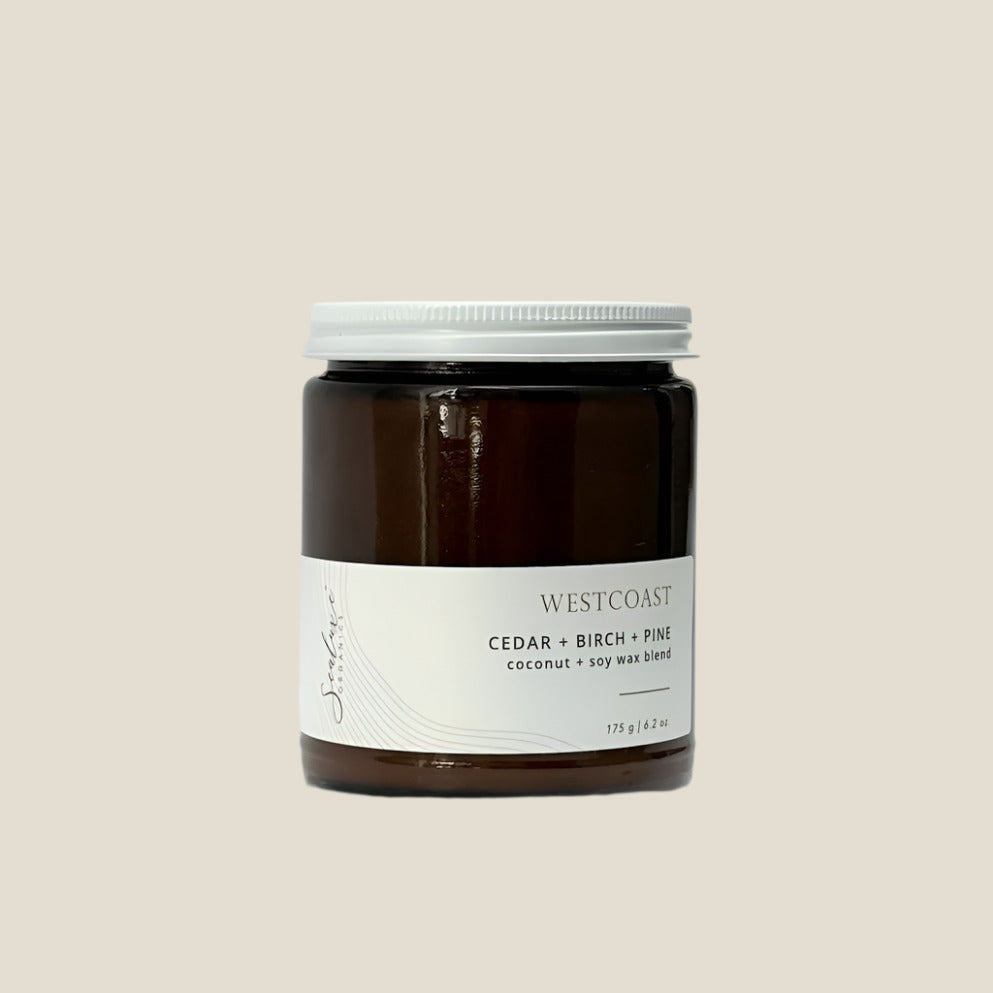 Brown jar with white lid on a white background