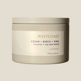 a grey tin with the label saying westcaost candle cedar, birch an dpine made with coconut and sox wax blend
